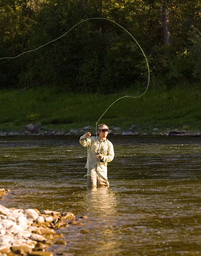 A picture of a fly-fisherman